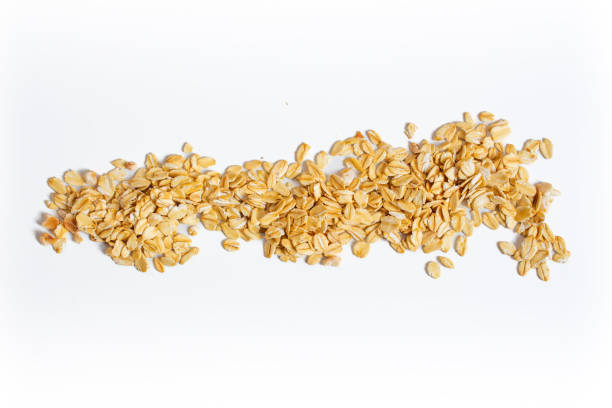 Dried oatmeal grains isolated on a white background. Top view.