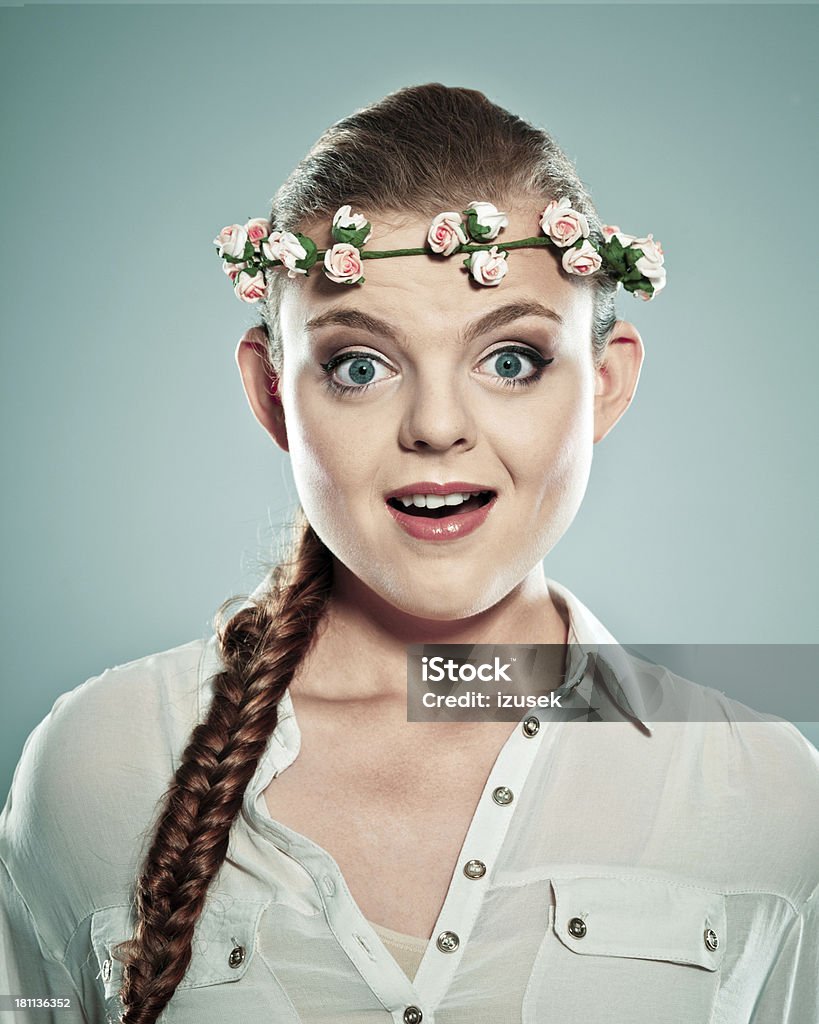 Surprised woman Portrait of surprised young adult woman wearing wreath headdress, looking at the camera. Studio shot. Women Stock Photo