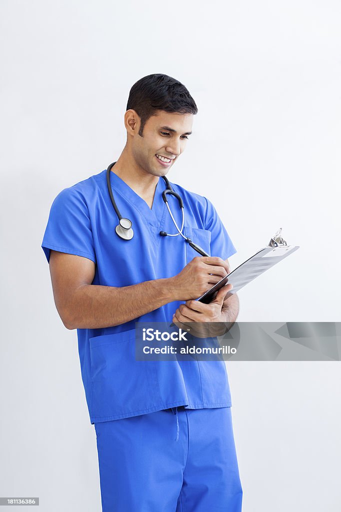 Young doctor writing a prescription 30-39 Years Stock Photo
