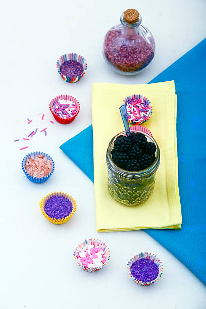 istock black berries in mason jar and  colored sugar 181136646