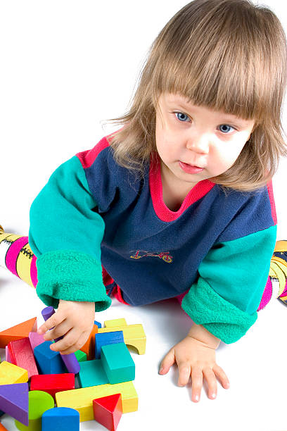 istock Little Girl and Toy Blocks 181136725