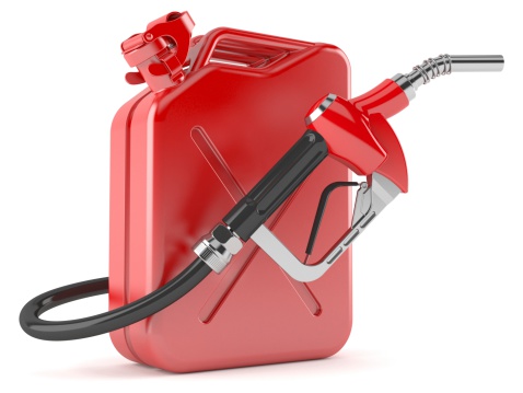 Hand of man holding red plastic gasoline can as if filling up isolated on white background