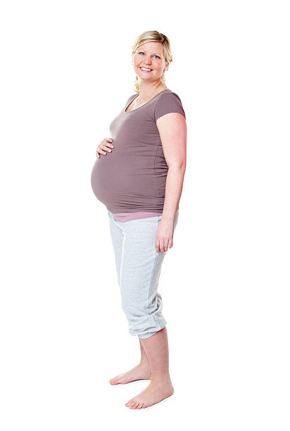 istock Showing off her baby bump 181137554