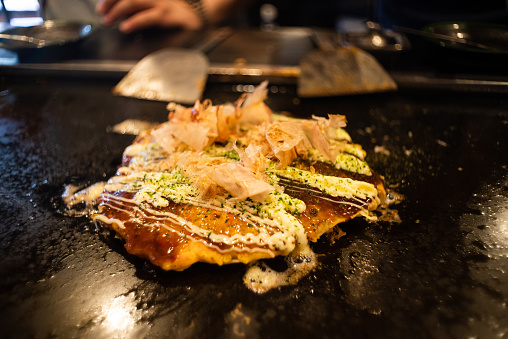 Okonomiyaki - Japan's B-Grade Gourmet
Finished okonomiyaki on the griddle.