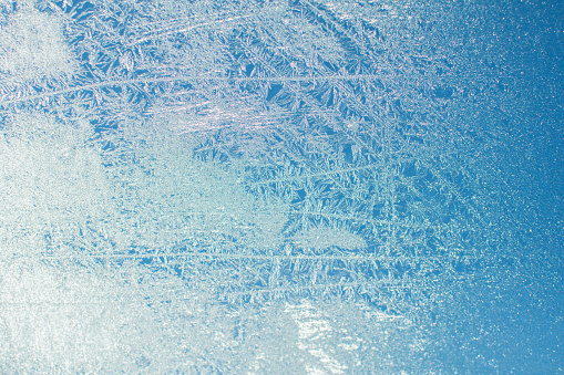 Winter frost on a window, copy space background