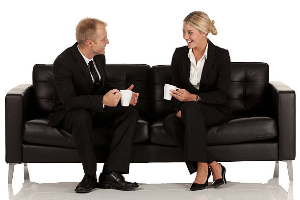 istock Business couple sitting on a couch 181138446