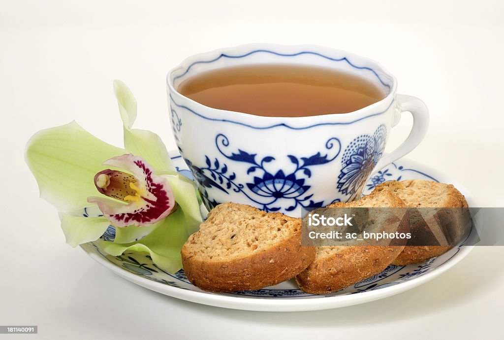 Tea and biscuits(+clipping path) Cup of tea with biscuits and flower, with clipping path Afternoon Tea Stock Photo