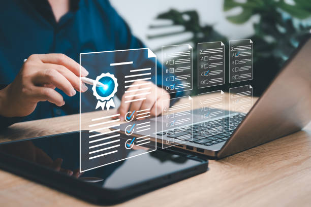 istock Certificate test documents, Online exams paperless in modern technology concept, Businessman use tablet making exams for Certificate approval, Business international standard certification of product 1811401766
