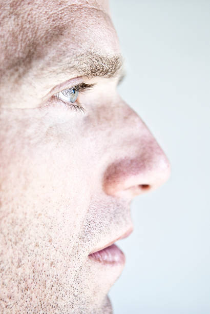 istock Serious Man Face with Prominent Nose in Profile 181141737