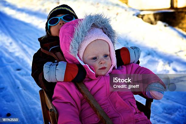 Kids Playing In The Snow Stock Photo - Download Image Now - Child, Childhood, Cute