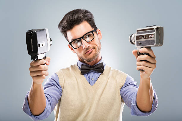 istock Retro revival man with old fashion camera 181142620
