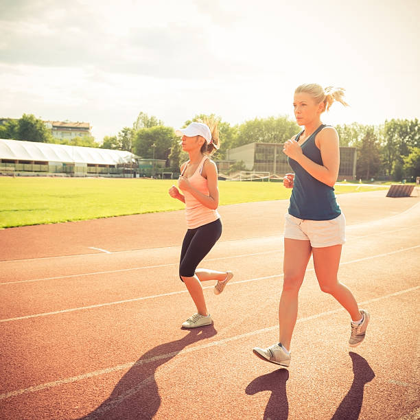 istock Two Beautiful Female Joggers 181142935