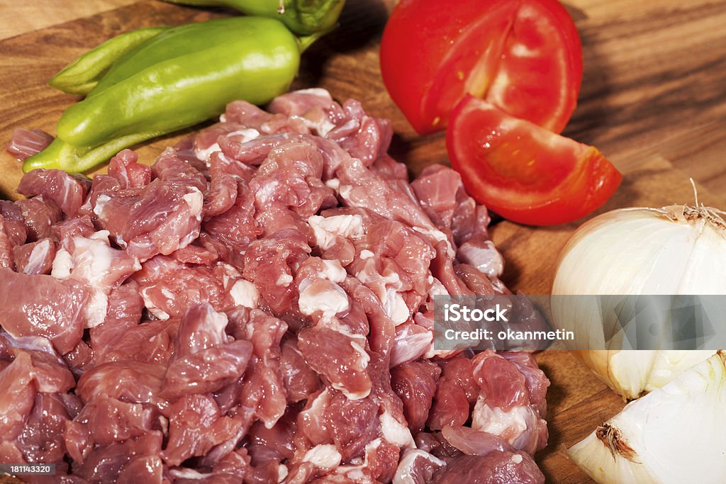 Carne a cubetti - Foto stock royalty-free di A forma di blocco