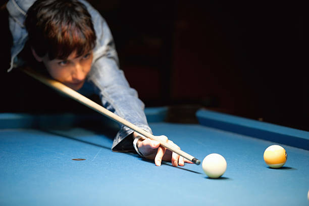 istock Girl Playing Pool Billiard 181143358