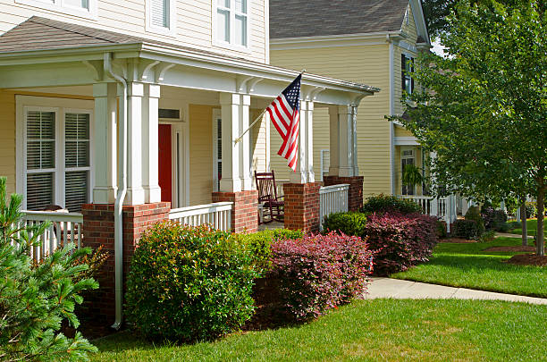 istock Front Porch with an American Flag 181143455