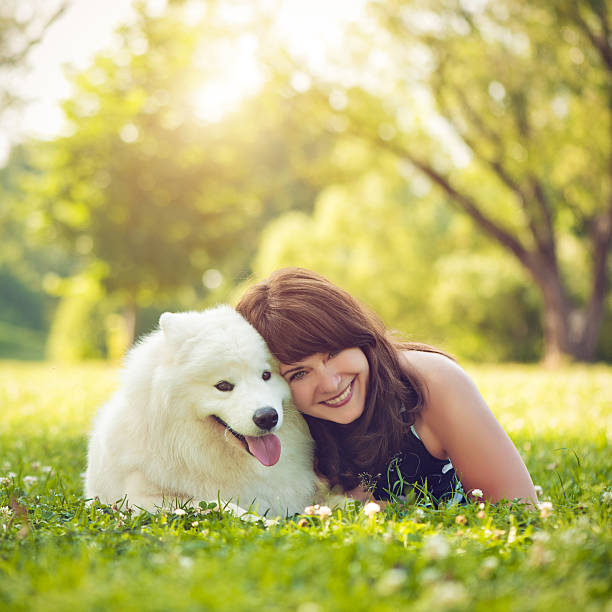 istock Woman with dog 181143922