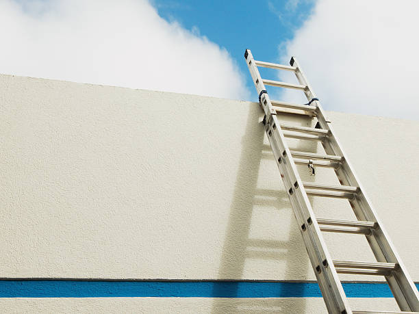 istock Extension Ladder leaning on building 181144022