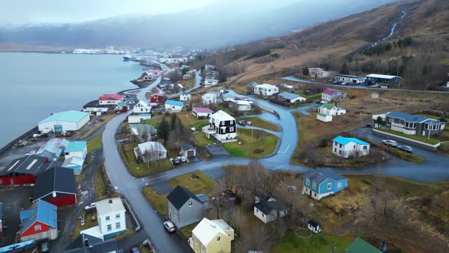 Picturesque fishing village by the sea. Winter weather. West Iceland - Pyramid mountain