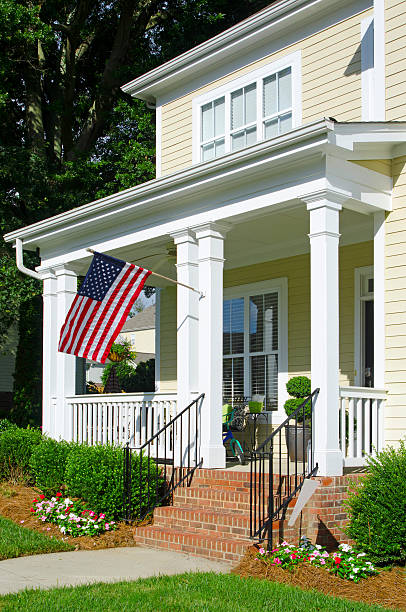 istock Front Porch with an American Flag 181144070