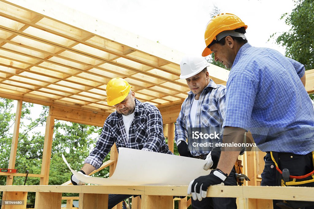 Trabalhadores de construção - Foto de stock de Discussão royalty-free
