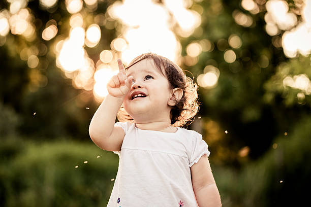 istock Little girl playing outdoor 181145492