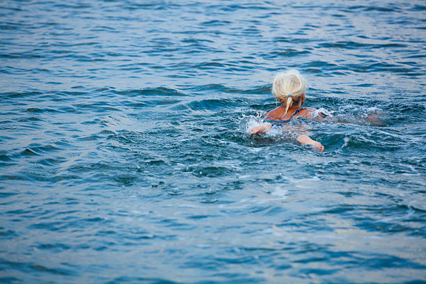 istock Senior Swimmer In The Sea 181146502
