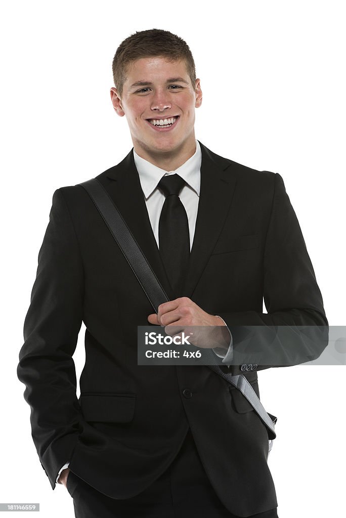 Confident businessman smiling Confident businessman smilinghttp://www.twodozendesign.info/i/1.png 20-29 Years Stock Photo
