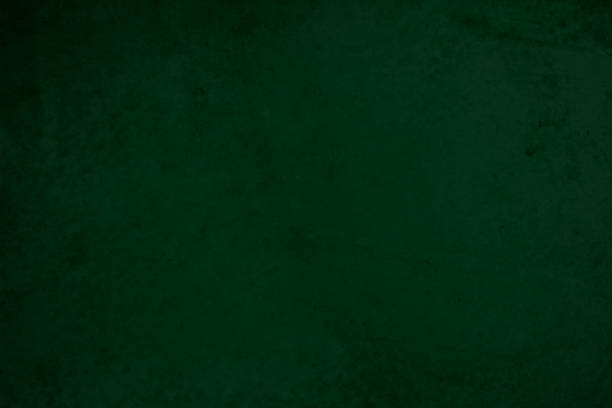istock Green chalkboard texture for school display backdrop. chalk traces erased with copy space for add text or graphic design grunge background. Green board. Dark green wall backdrop. Education concepts. 1811465871