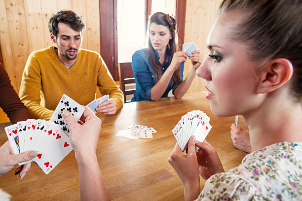istock Friends Playing Cards 181147089