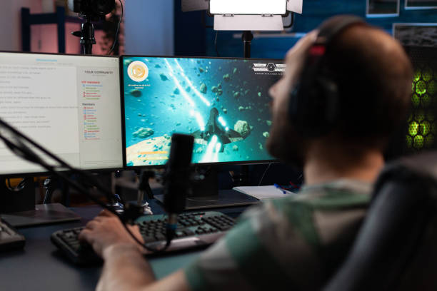 istock Man playing video games on online stream with chat 1811479881