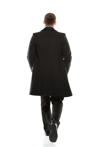 Rear view of a businessman walkinghttp://www.twodozendesign.info/i/1.png