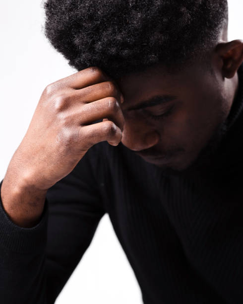 istock Close up of upset black man think about something 1811482702