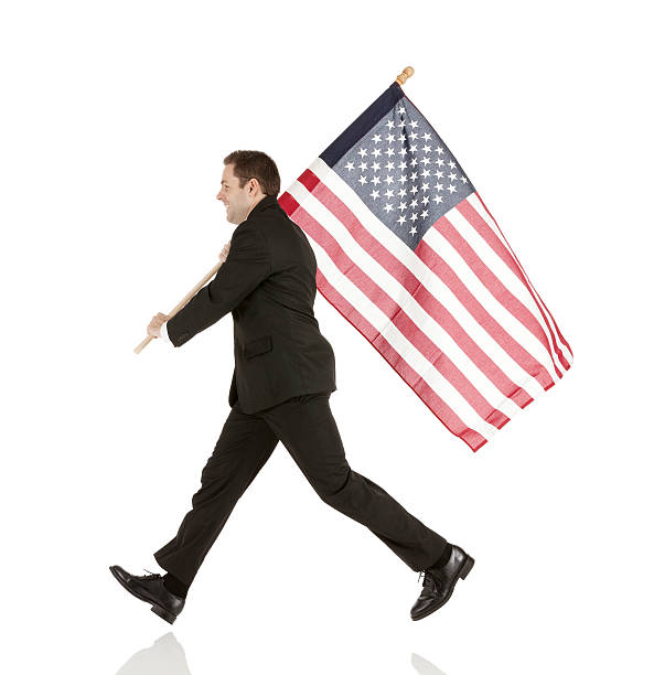 istock Businessman carrying an American flag 181148486