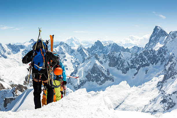 Alpine climbers on ridge at Mont Blanc, Chamonix, France