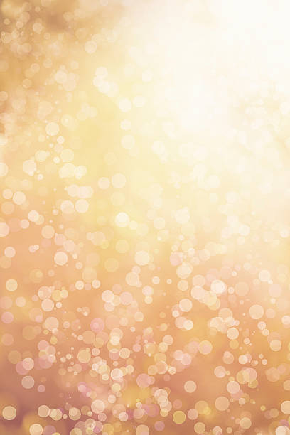 złoty bokeh - gold backgrounds textured textured effect stock illustrations