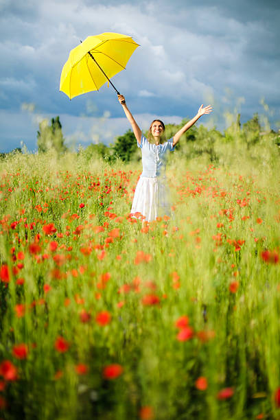 istock Woman in poppy fields 181148851