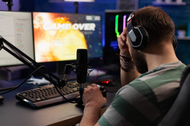 istock Person losing video games on live stream with chat 1811489413