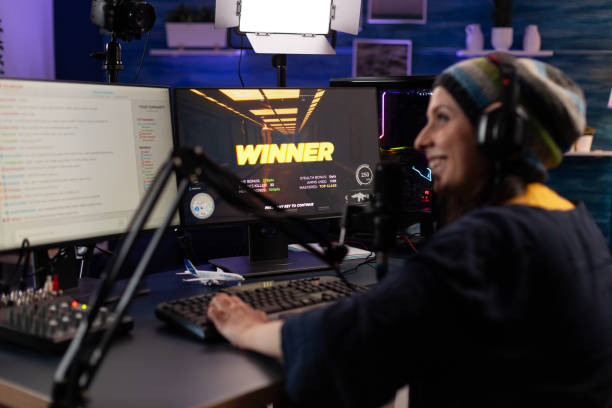 istock Player winning video games on live stream with chat 1811491141