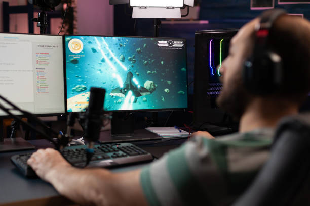 istock Gamer playing video games on stream with live chat 1811491680