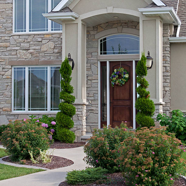 istock Front entry of home with landscaping 181149409