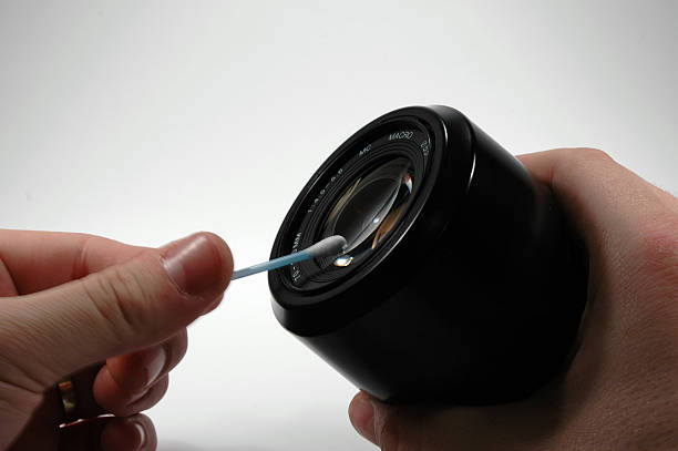 istock Clean a photolens with a cotton  bud 181149442
