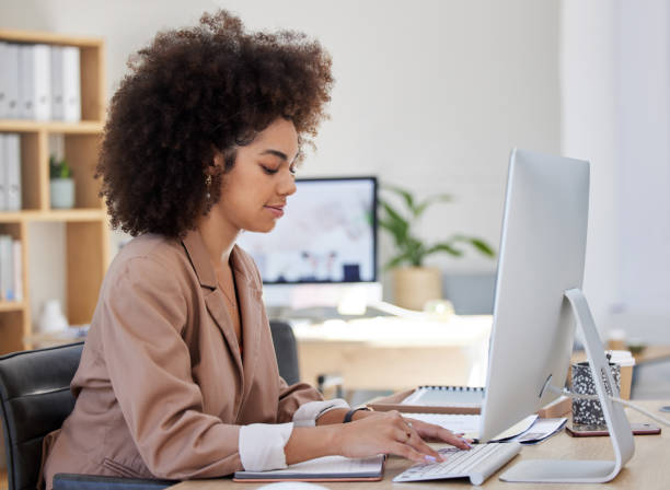 istock Business, website or woman typing on computer working on email or content research project online. Technology, seo data feedback or girl journalist writing blog report or internet articles with focus 1811500180