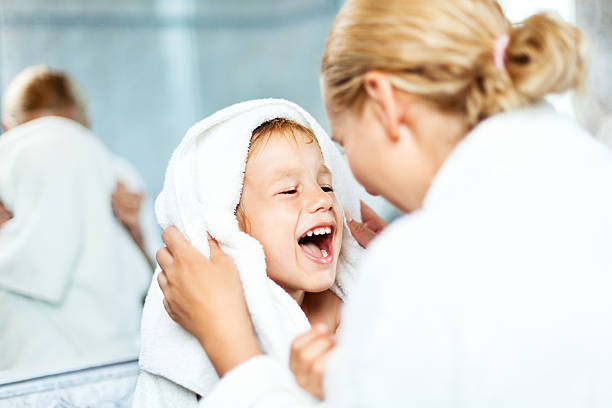 istock Mother drying up son after bath 181150123