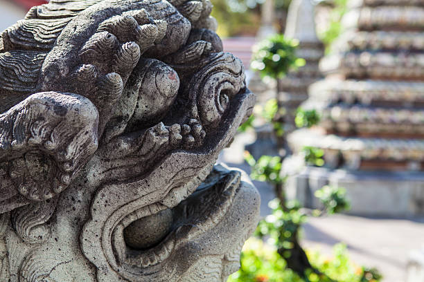 istock Guardian Statue at Wat Pho in Bangkok Thailand 181150360