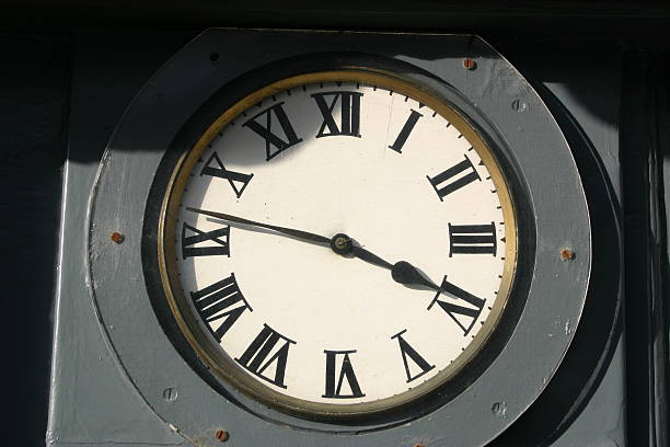 Clockface in Shadow stock photo