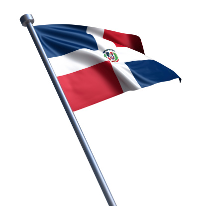 Flag of the Dominican Republic on modern metal flagpole.