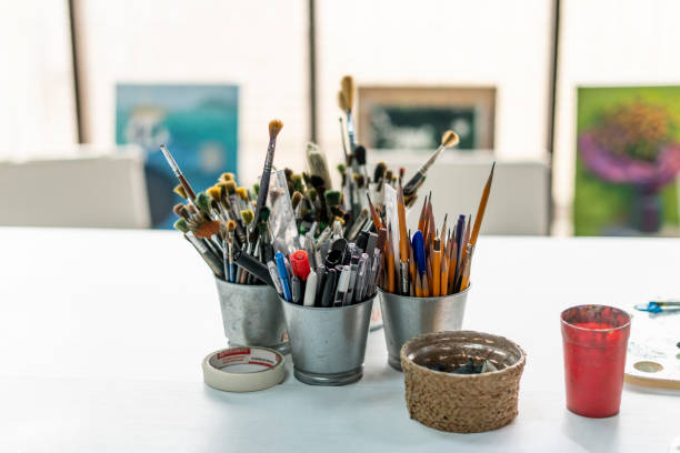 istock Set of artistic brushes in a jar, professional artist's tools in the workshop 1811512319