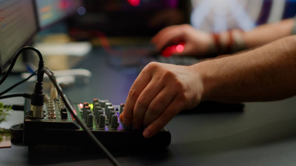 istock Close up of professional keyboard with RGB lighting streaming at chat 1811515321