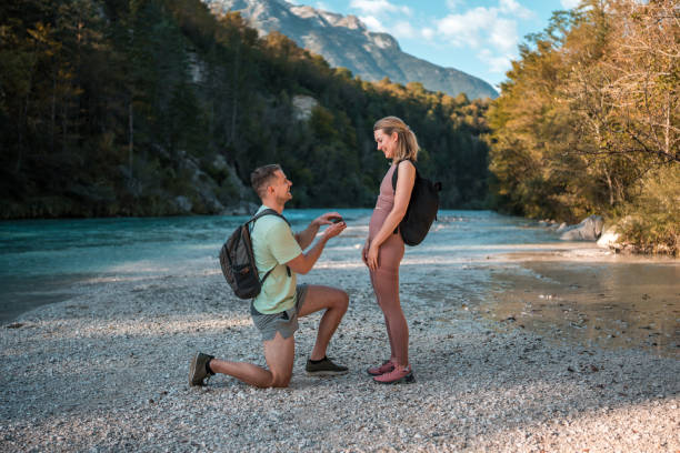 istock Caucasian Male Proposing by the River 1811515380