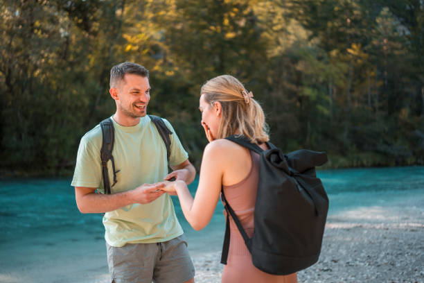 istock Caucasian Male's Romantic Ring Moment by the River 1811515388